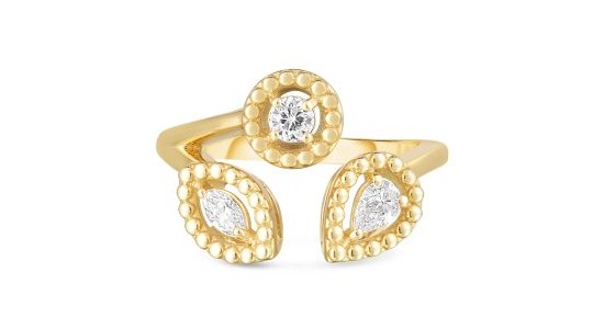 a yellow gold fashion ring featuring diamonds of three different cuts